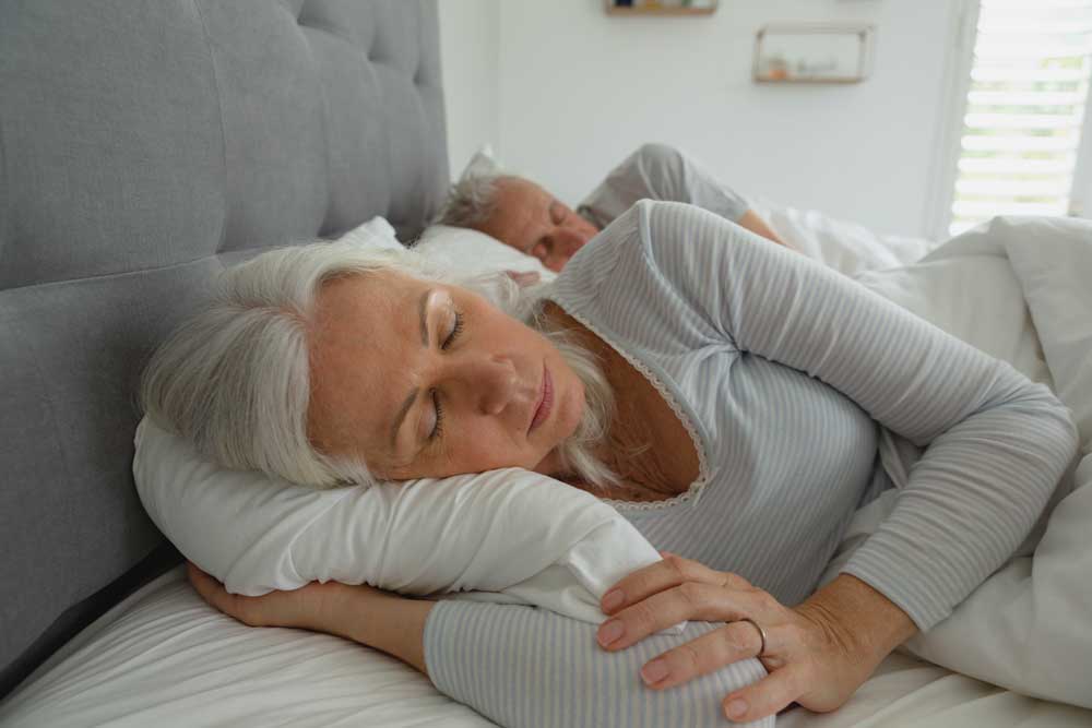 Sleeping senior couple