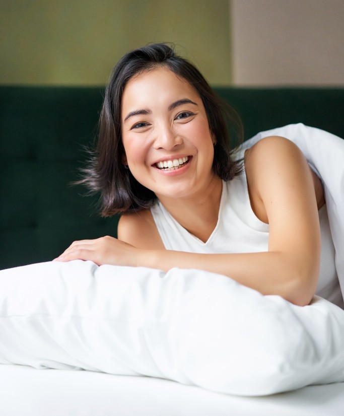 vertical-shot-of-smiling-korean-woman
